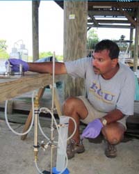 Dr. Sid Mitra completing fieldwork in 2010.