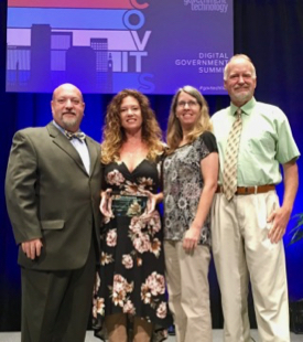 Four members of the WetCAT team accepted the Governor’s Award in the category  “IT as Efficiency Driver - Government to Citizen.” From L: Dave Davis, director of the Office of Wetlands & Stream Protection at the Virginia Department of Environmental Quality; Michelle Henicheck, Senior DEQ Wetlands Ecologist; Tami Rudickny, senior GIS programmer with CCRM at VIMS; and Dr. Kirk Havens, CCRM assistant director. © D. Loftis/VIMS.