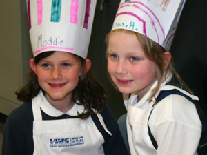 Madeline Peebles and Brenna Hendrix of Ware Academy in Gloucester during the Healthy Bay for Healthy Kids event. Photo by David Malmquist.